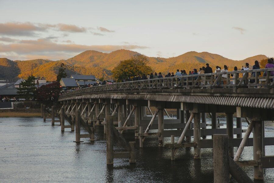Togetsukyo Bridge over Katsura River at sunset in Arashiyama Kyoto