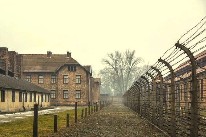 Auschwitz Birkenau Memorial and Museum group tour from Krakow - Entering Auschwitz I and Birkenau with an English guide
