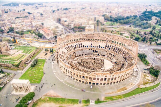 Colosseum Escorted Entrance Combo Pass with Open Bus - Roman Forum and the Arch of Constantine: read the city’s center