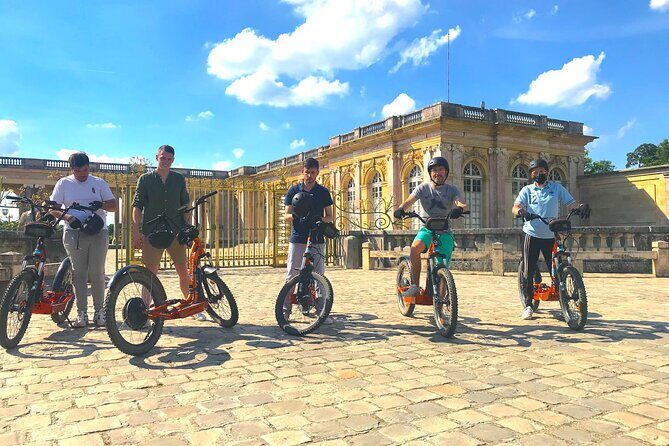 Discover Versailles on electric 2-wheelers (Yes to PRM) - Apollo fountain stop and the Orangerie water views