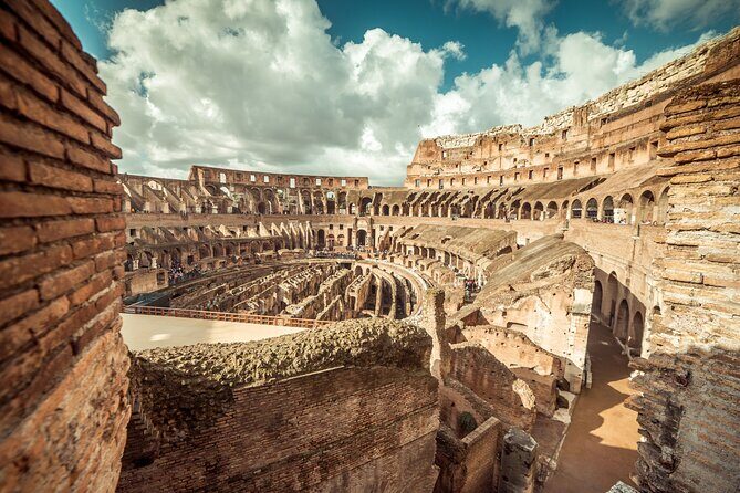 Exclusive Colosseum Tour with Top-Rated Guide - Ground-Level Arena Views: Gladiators, Beasts, and Sea Battles