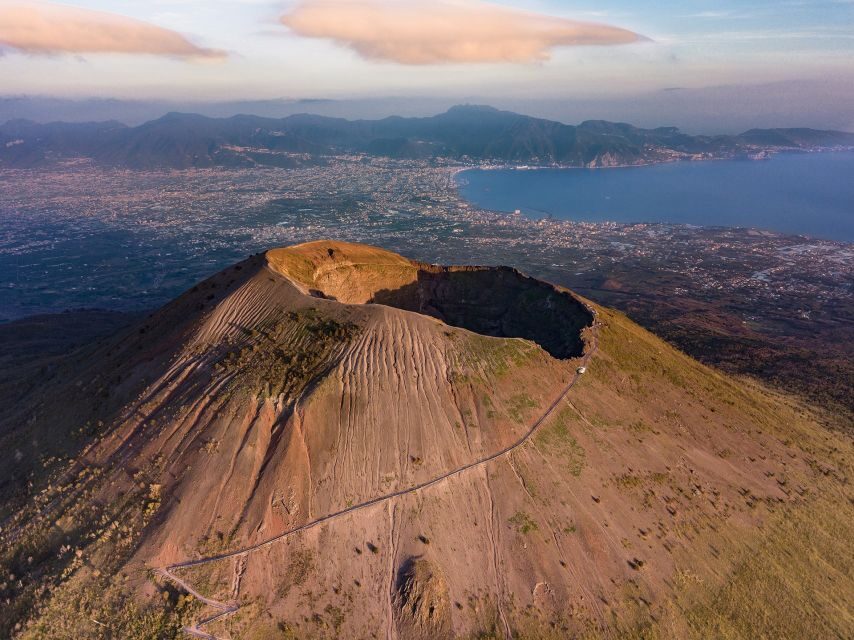 From Sorrento: Pompeii and Vesuvius Tour by Express Train - Pompeii with skip-the-line entry and a guided sweep