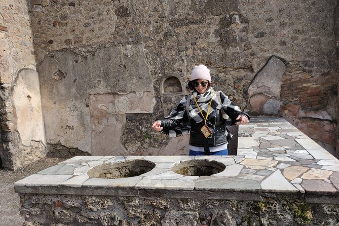 Private Pompeii Tour with Fast-Entrance Tickets to the Ruins & Exclusive Guide - Via dell’Abbondanza: shops, bakeries, and the Temple of Isis