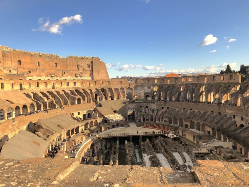Rome: Colosseum Arena Guided Tour with Roman Forum Option - Guide quality: headsets, humor, and multilingual help