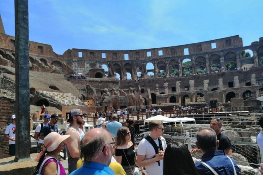 Rome: Colosseum Guided Tour - Roman construction techniques: travertine, tuff, and arches you can spot
