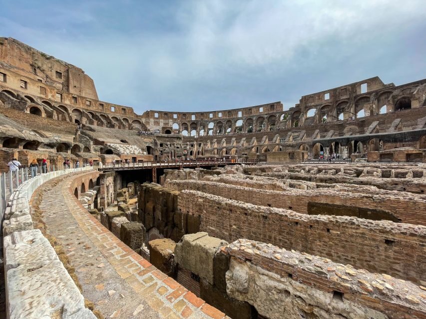Rome: Colosseum Tour with Access to the Gladiator Arena - Entering the Colosseum Through the Arena Floor Gate