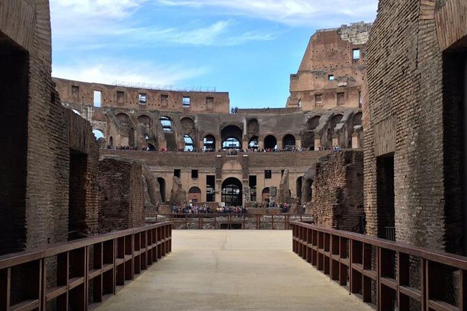 Rome: Private Colosseum, Arena and Underground Tour with Pick-Up - Entering the Colosseum With Reserved Access and a Blue Badge Guide