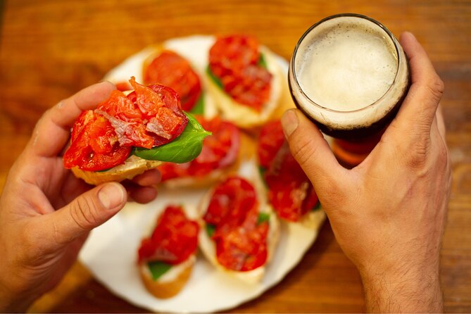 Rome: Private Food & Aperitivo Tour with Vatican Views - Stop 2: Via Ostia wine bar bites (cheese, cured ham, bruschetta)