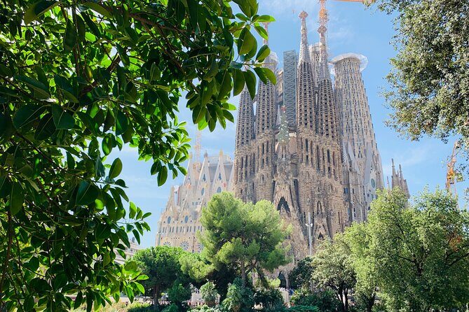 Sagrada Familia & La Pedrera Small Group Tour with Cava Tasting - La Pedrera (Casa Milà) inside: stone waves, wrought iron, and rooftop cues
