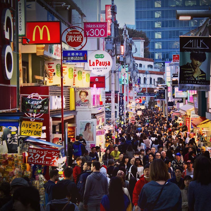 Crowded Takeshita Street in Harajuku Tokyo filled with colorful shops